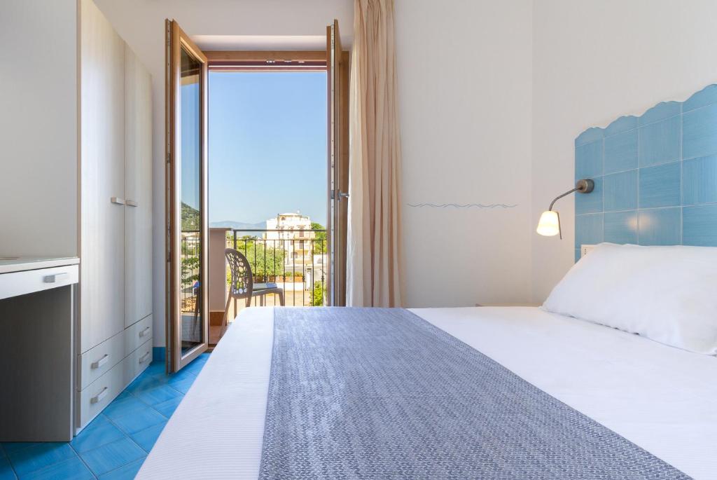 Postel nebo postele na pokoji v ubytování B&B Sperlonga