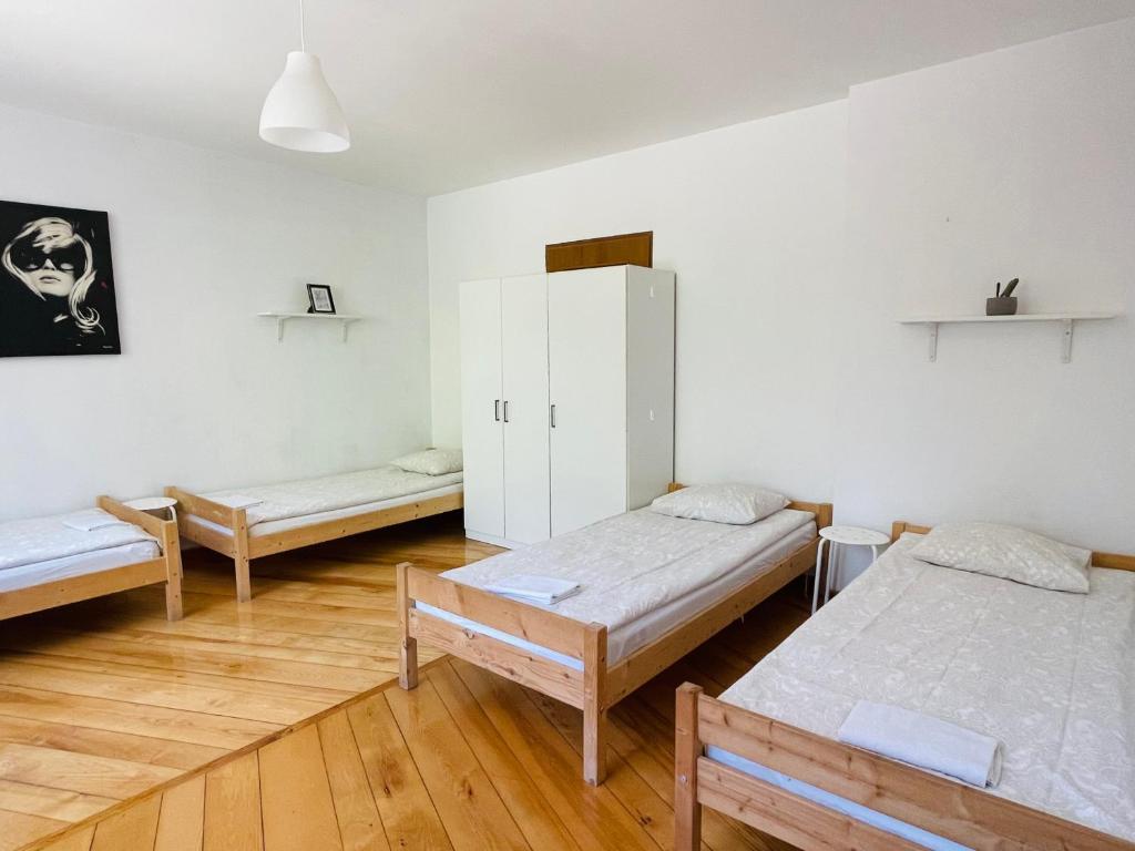 Posteľ alebo postele v izbe v ubytovaní Pokoje Slawin