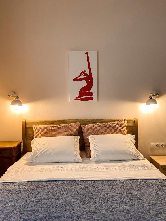 Postel nebo postele na pokoji v ubytování Avli