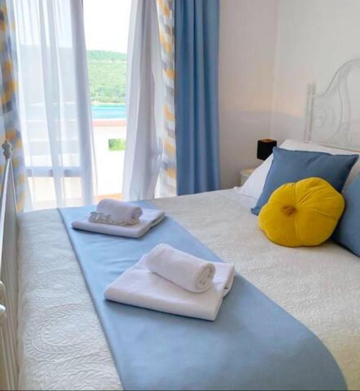 Postel nebo postele na pokoji v ubytování SEA wa ve