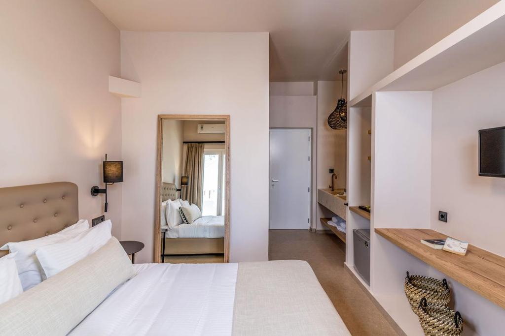 Łóżko lub łóżka w pokoju w obiekcie Hotel Eucalyptus