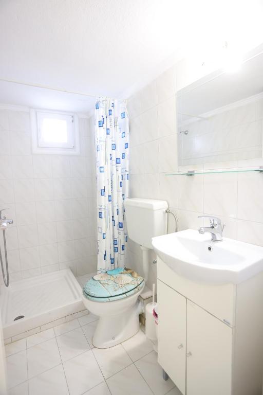 Koupelna v ubytování Holiday Apartment Siviri