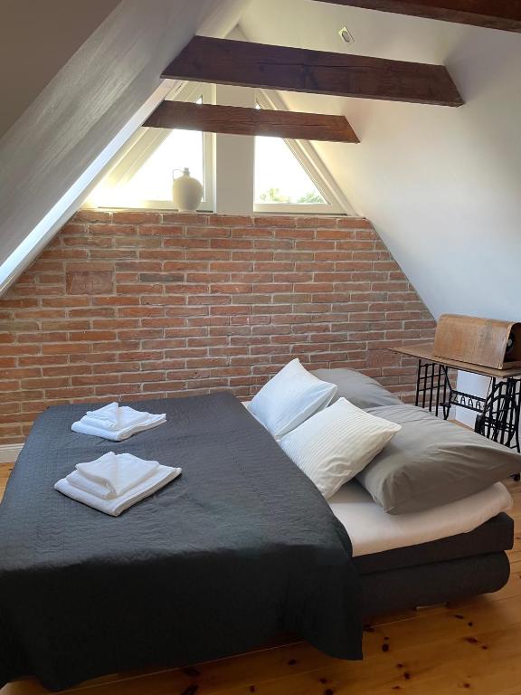 Postel nebo postele na pokoji v ubytování Apartmán U Březinů
