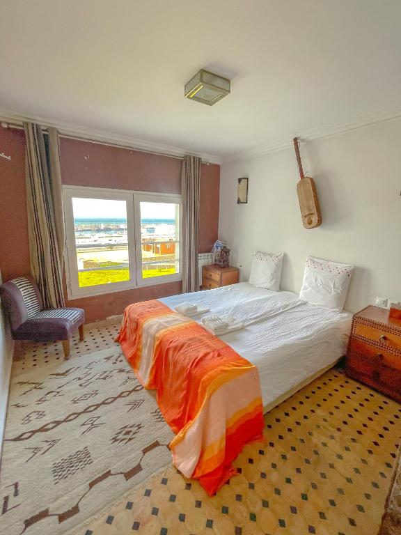 Postel nebo postele na pokoji v ubytování Le balcon de tanger