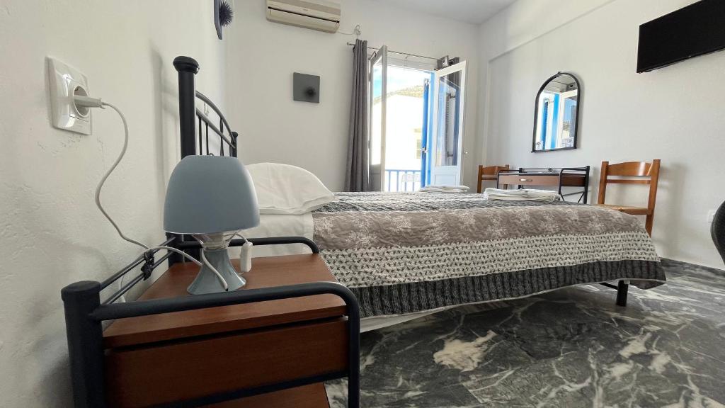 Voodi või voodid majutusasutuse Meropi Rooms toas