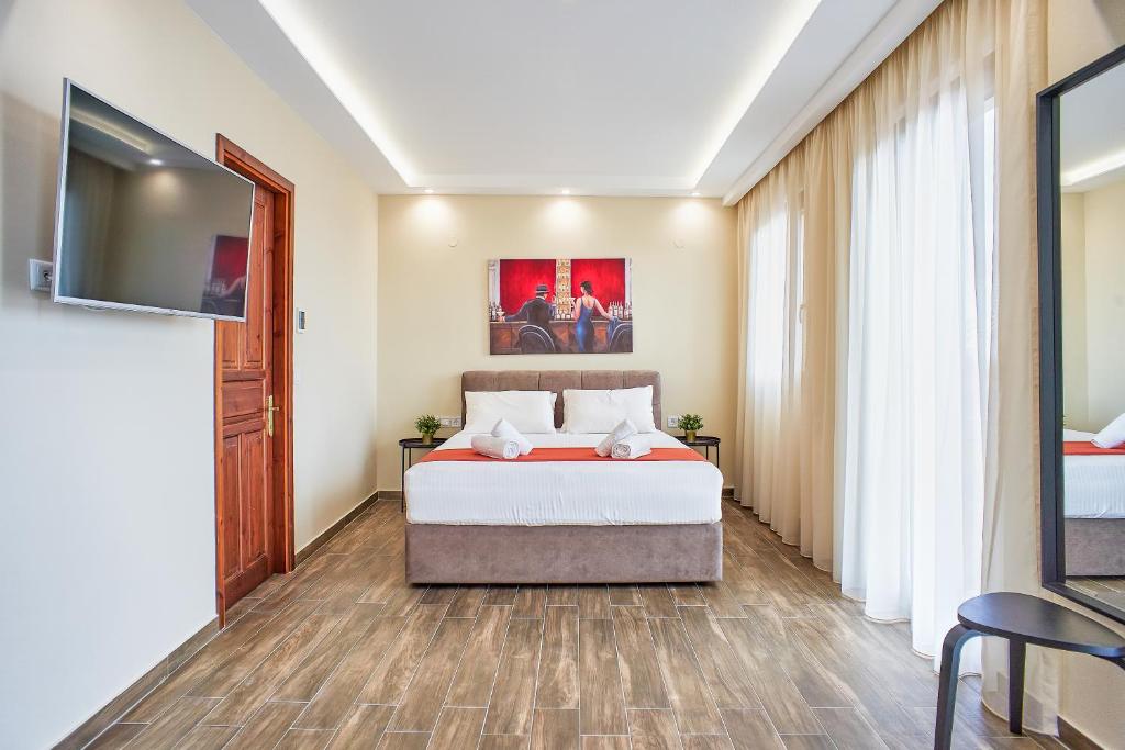 Postel nebo postele na pokoji v ubytování LP Luxury Suite - Old Town Xanthi