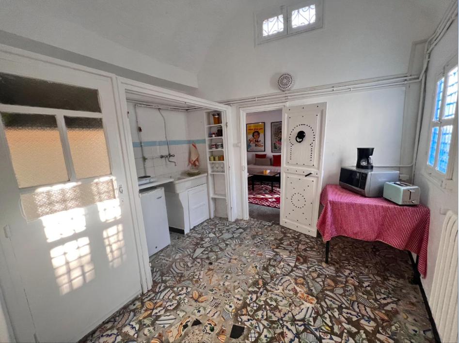 Kuchyň nebo kuchyňský kout v ubytování OLIVIA Guest House (Eya & Abbes)