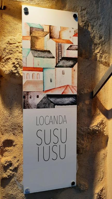 Certifikát, hodnocení, plakát nebo jiný dokument vystavený v ubytování "Locanda Susuiusu" keyless entry