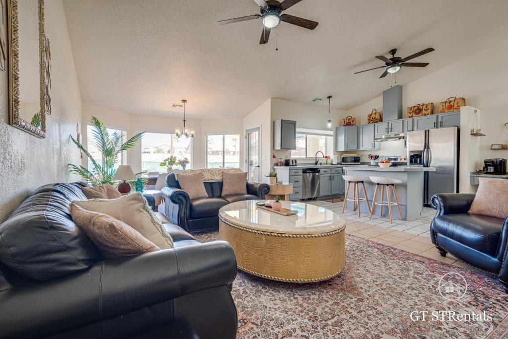 a living room with a couch and a table at FRESHWATER FUN - Pet & Family Friendly with Great Location! in Bullhead City