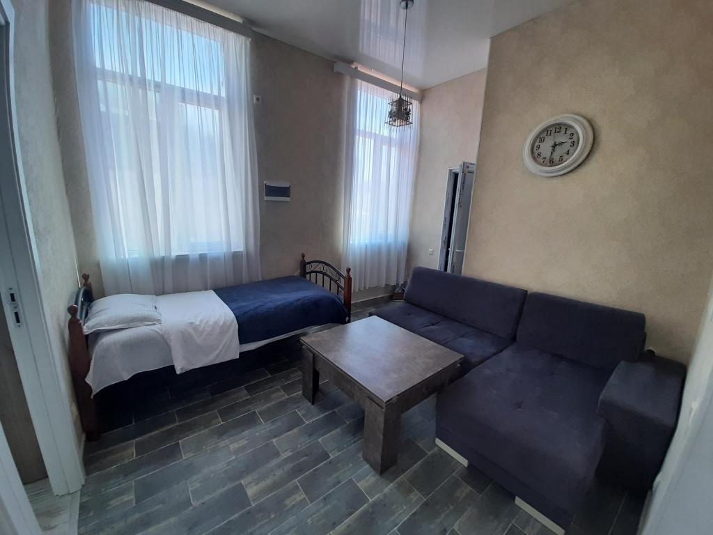 Кровать или кровати в номере Центр города Батуми Apartment Rustaveli 13