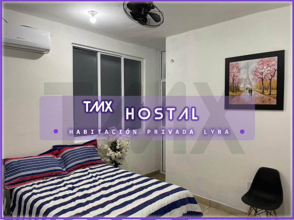Letto o letti in una camera di TMX HOSTAL
