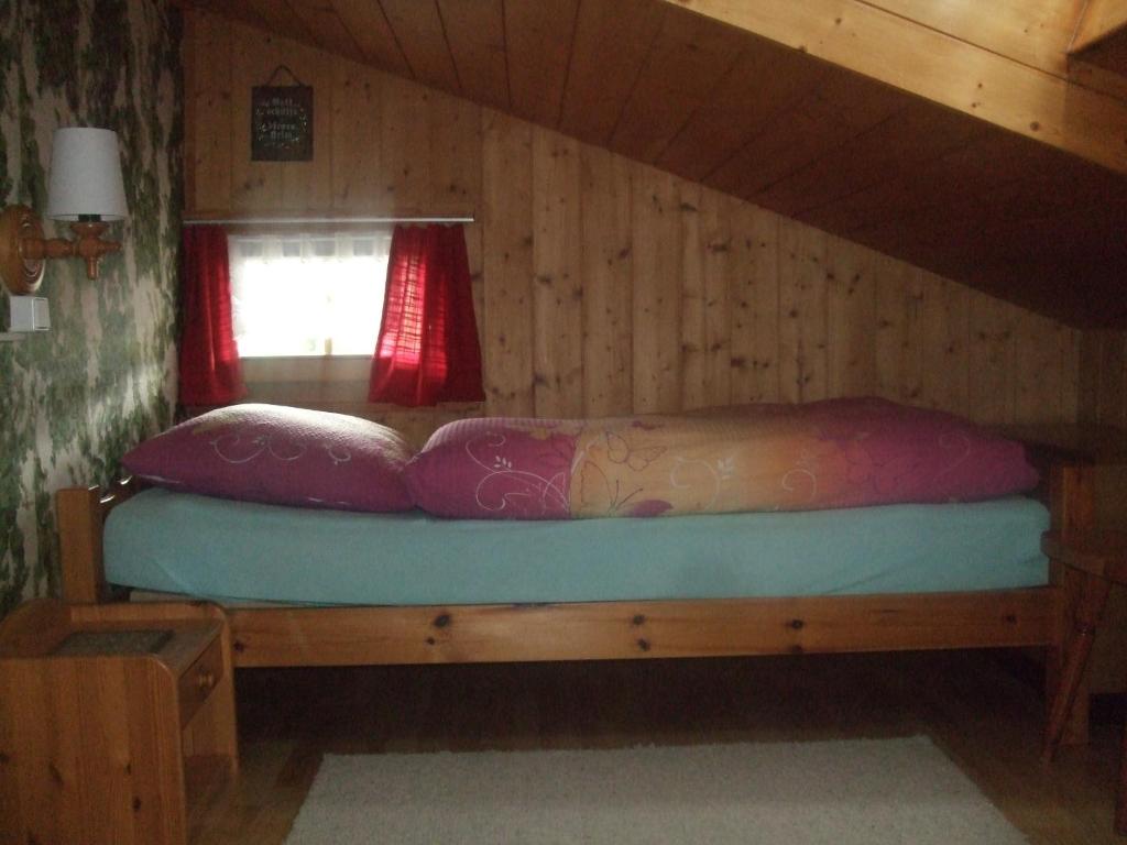 Łóżko lub łóżka w pokoju w obiekcie Apartment Nadeschda