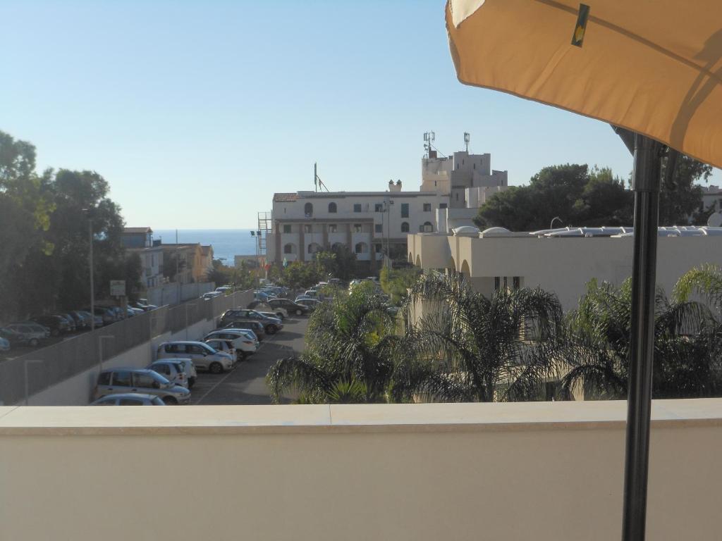 a view from a balcony of a parking lot at Villa Giambona in Isola delle Femmine