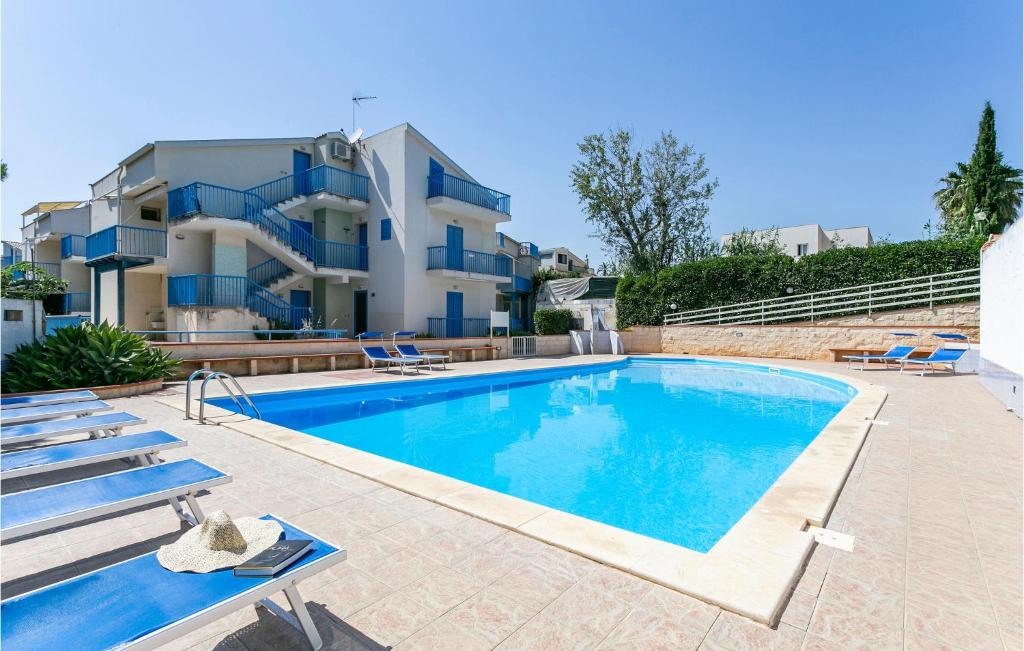 Beautiful home in Marina di Ragusa with 2 Bedrooms, WiFi and Outdoor swimming pool