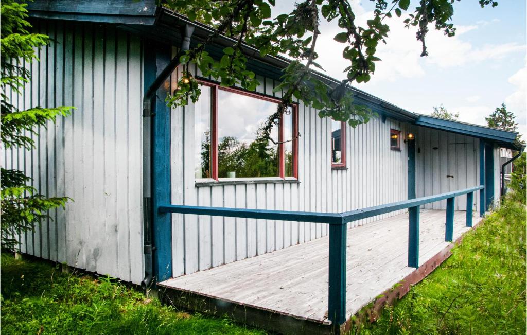 a tiny house with a porch and a window at 3 Bedroom Gorgeous Home In Trysil in Trysil