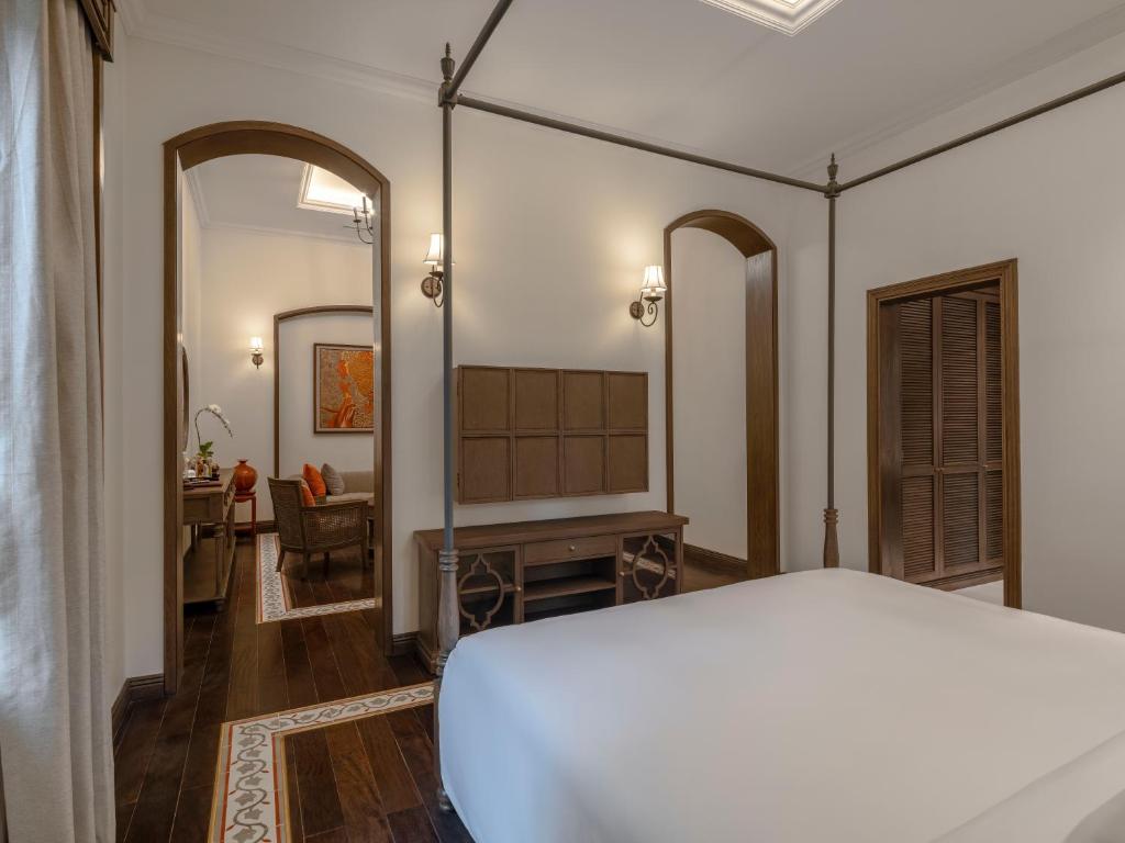 Postel nebo postele na pokoji v ubytování De Syloia Hotel