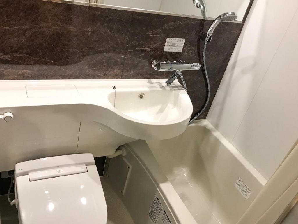 Koupelna v ubytování HOTEL LiVEMAX Shinyokohama