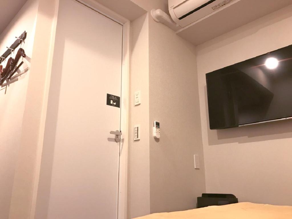 TV a/nebo společenská místnost v ubytování HOTEL LiVEMAX Shinyokohama