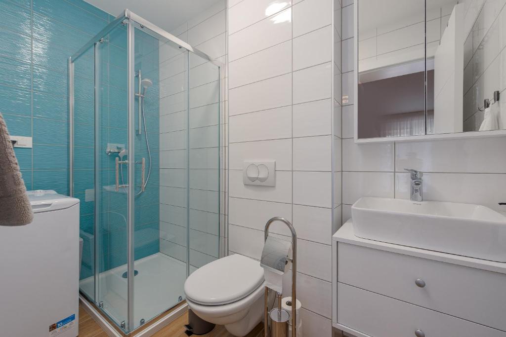 Kúpeľňa v ubytovaní Apartmani Diva
