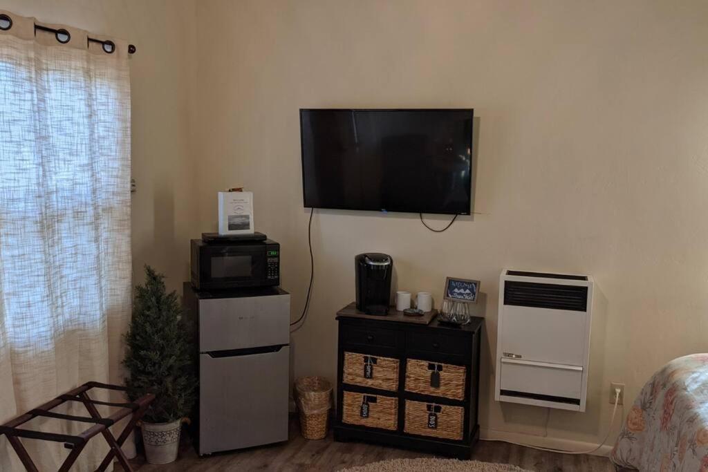 Kuchyň nebo kuchyňský kout v ubytování Cozy Cabin