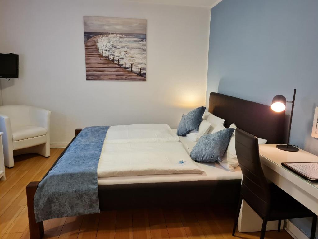 Postel nebo postele na pokoji v ubytování Hotel Herrenhof