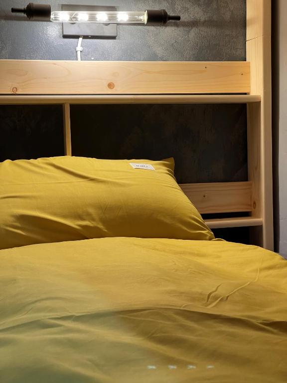 Letto o letti in una camera di Seagather海遇旅宿