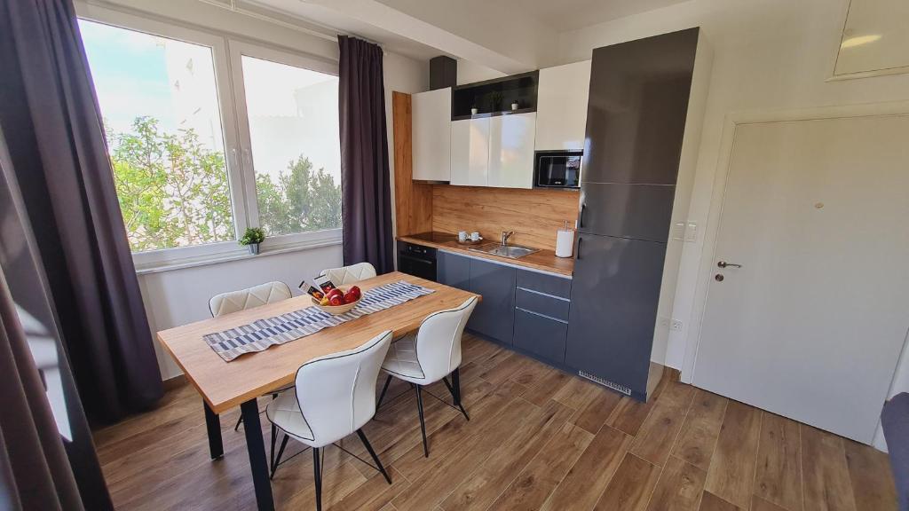 Kuchyň nebo kuchyňský kout v ubytování Villa Silente