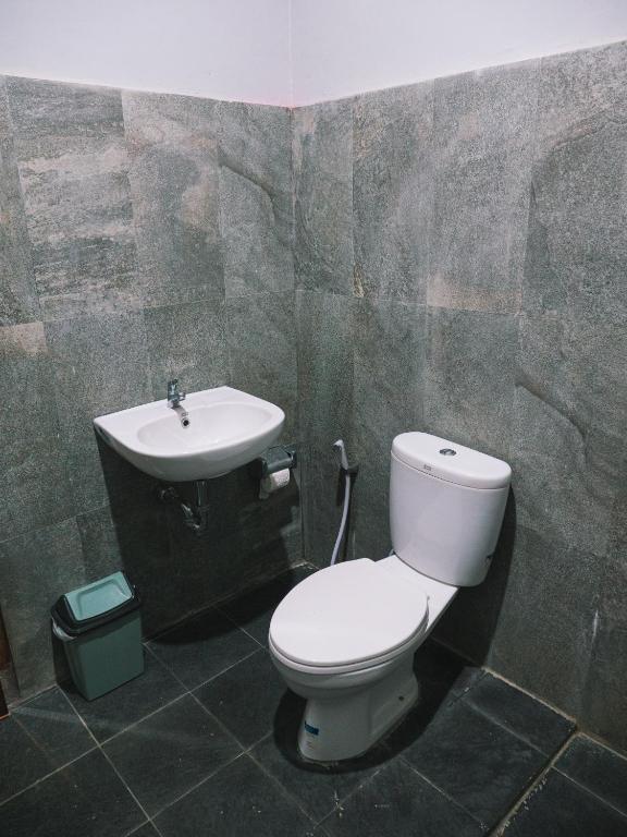 Koupelna v ubytování Tumpaksewu Homestay