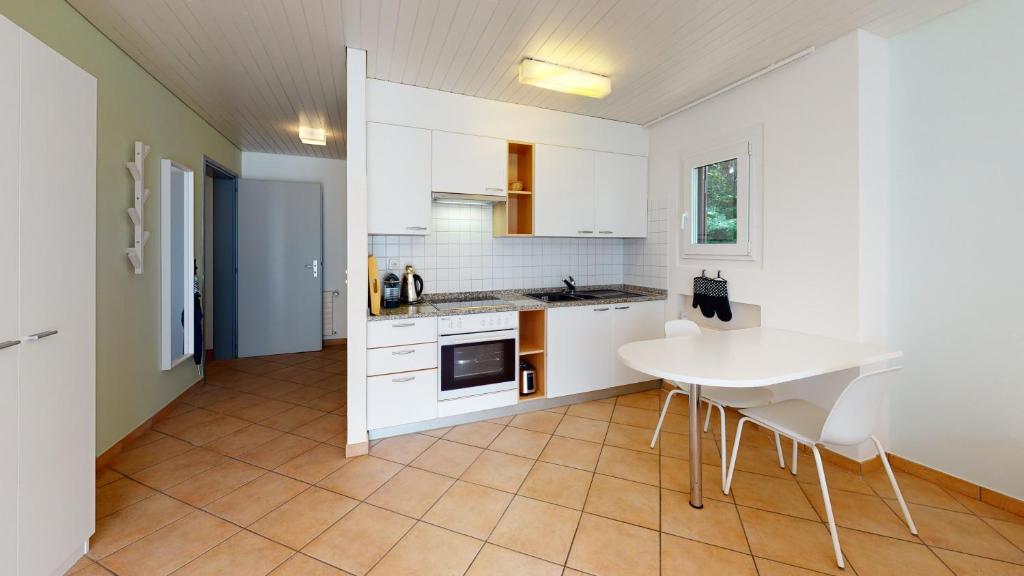 Kuchyň nebo kuchyňský kout v ubytování Reka-Ferienanlage Gandria