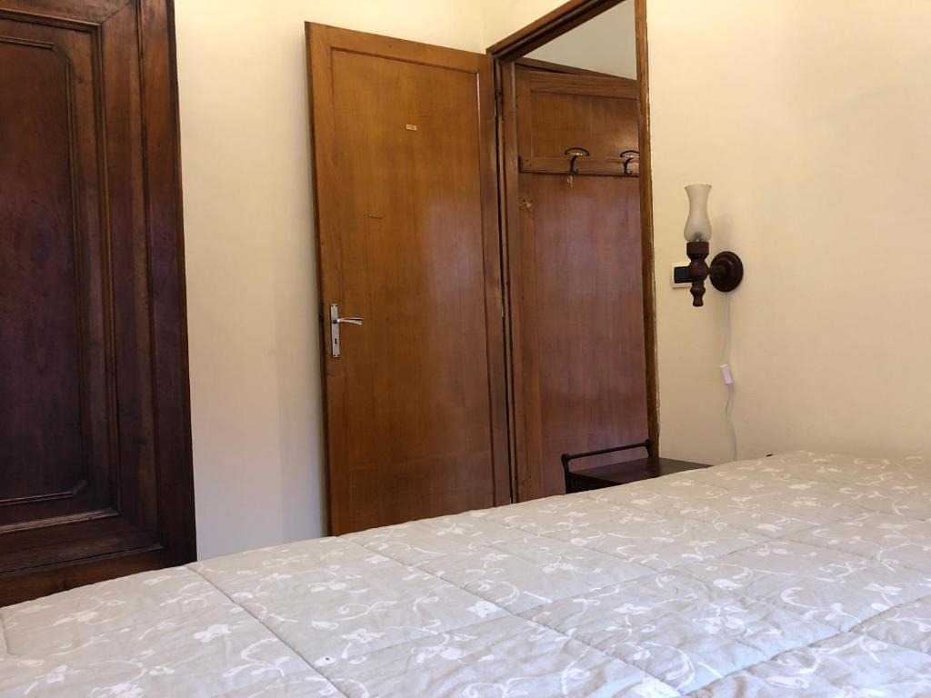Postel nebo postele na pokoji v ubytování Borgo Villa