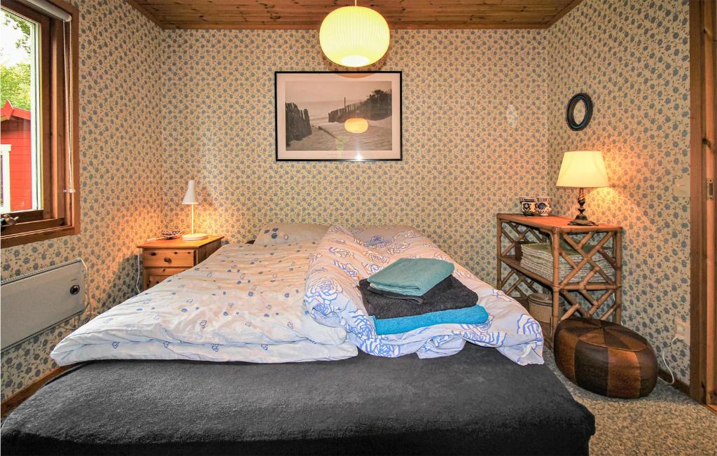 Postel nebo postele na pokoji v ubytování 4 Bedroom Beautiful Home In Perstorp