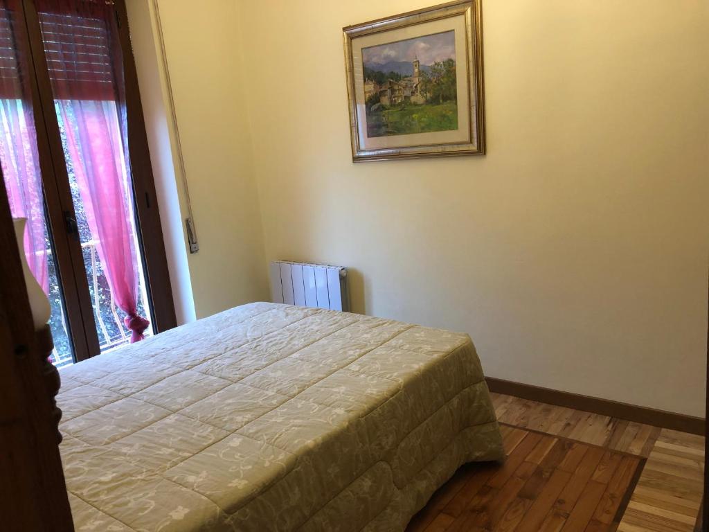 Postel nebo postele na pokoji v ubytování Borgo Villa