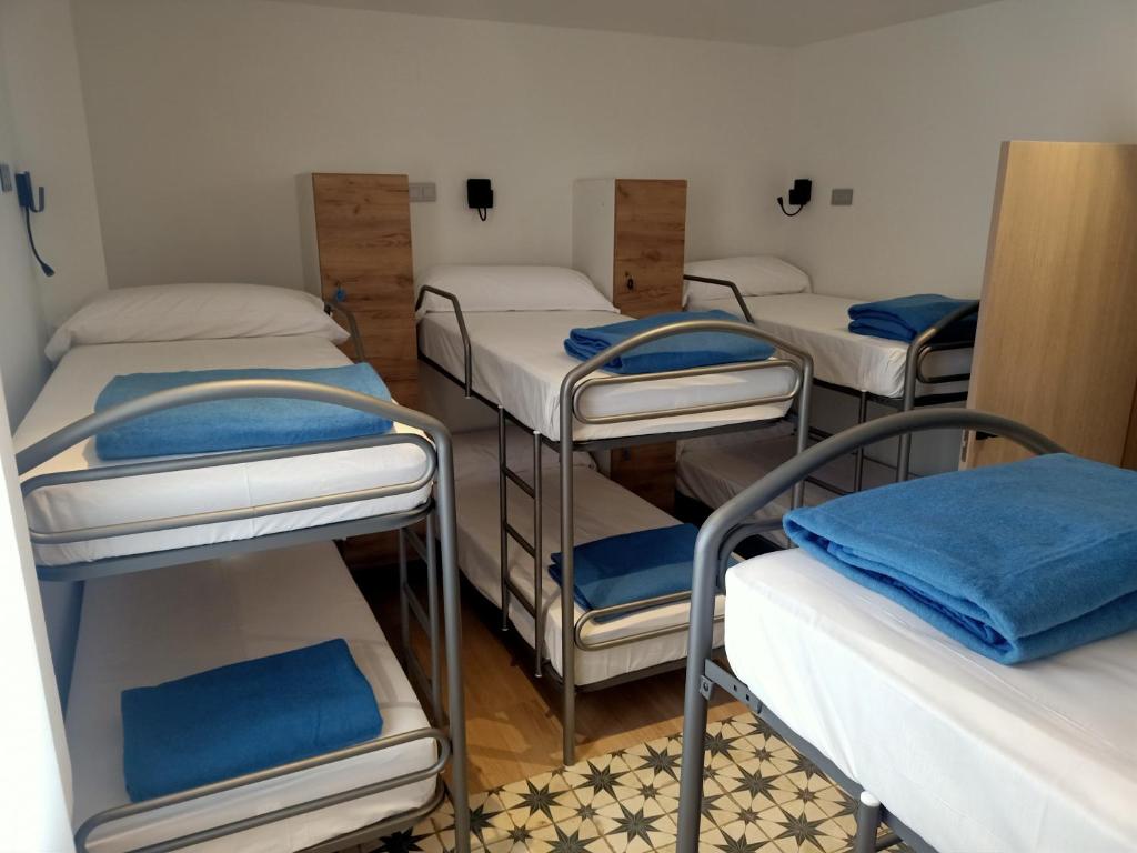 Albergue La Huellaにあるベッド
