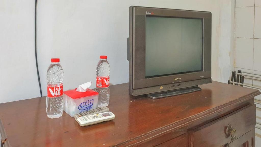 TV a/nebo společenská místnost v ubytování Hotel Jaya Kusuma near Candi Prambanan Mitra RedDoorz