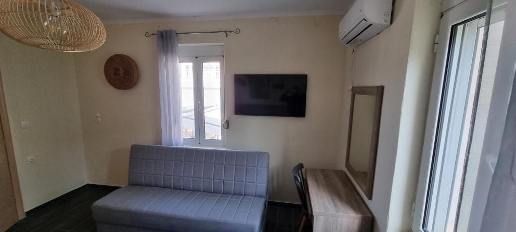 Televízia a/alebo spoločenská miestnosť v ubytovaní Fifi's luxury apartment