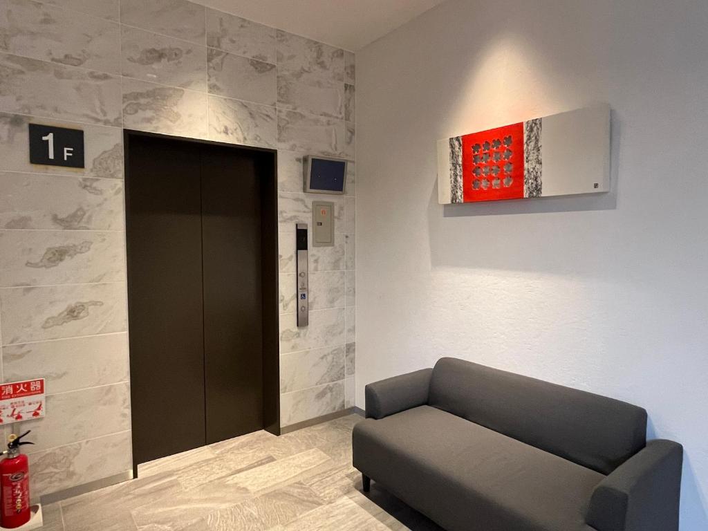 Posezení v ubytování Plaza In Kanku Hotel