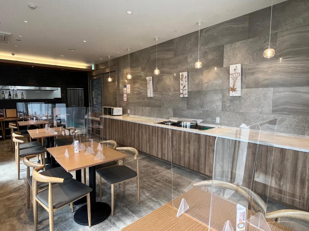 Restaurace v ubytování Plaza In Kanku Hotel