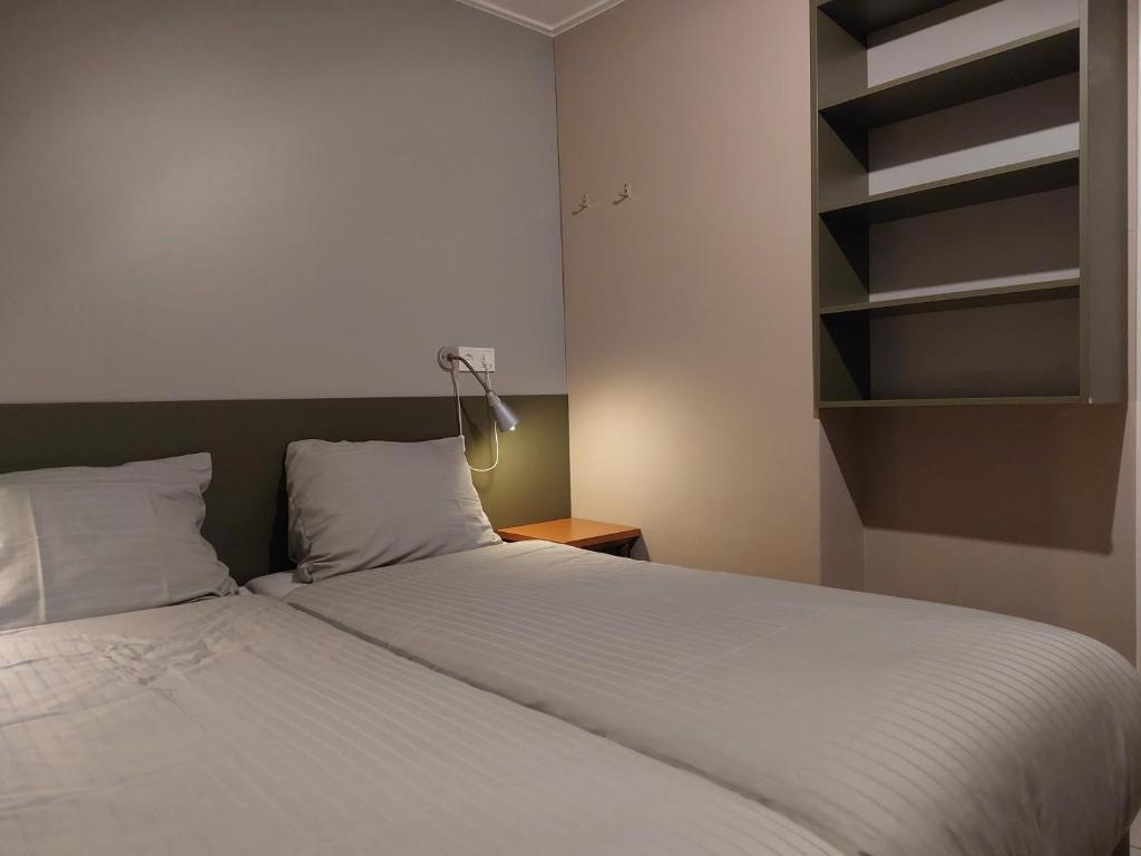 Postel nebo postele na pokoji v ubytování Boszicht 1 appartement in Oostkapelle
