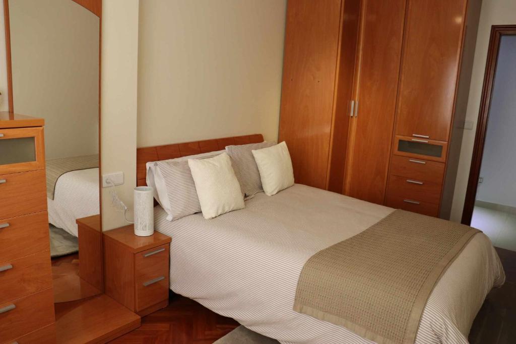 Posteľ alebo postele v izbe v ubytovaní Apartamento Xanela o Mar