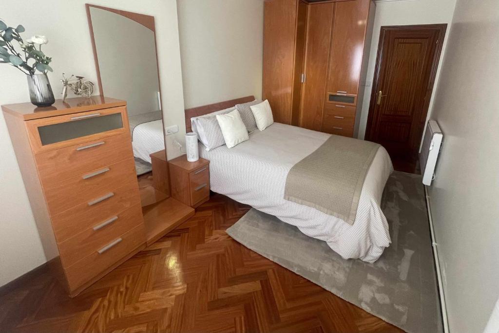 Posteľ alebo postele v izbe v ubytovaní Apartamento Xanela o Mar