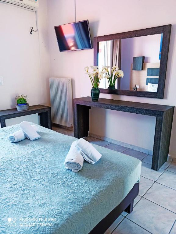 Ένα ή περισσότερα κρεβάτια σε δωμάτιο στο No Name Apartments