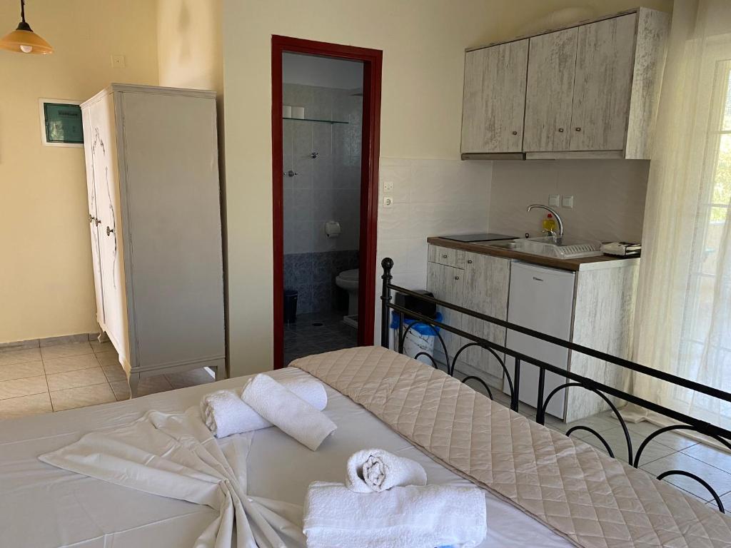 Posteľ alebo postele v izbe v ubytovaní Studio Fofo Villa Marifay
