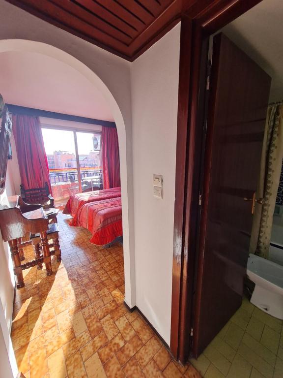 Postel nebo postele na pokoji v ubytování Hotel Tachfine