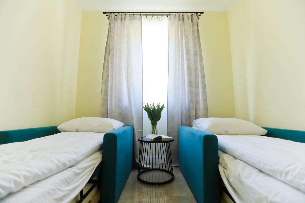Posteľ alebo postele v izbe v ubytovaní M&K Apartamenty Rodzinny, Gdańsk - Wyspa Sobieszewska