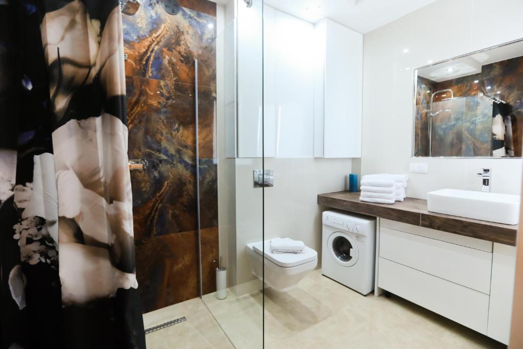 Kúpeľňa v ubytovaní M&K Apartamenty Rodzinny, Gdańsk - Wyspa Sobieszewska