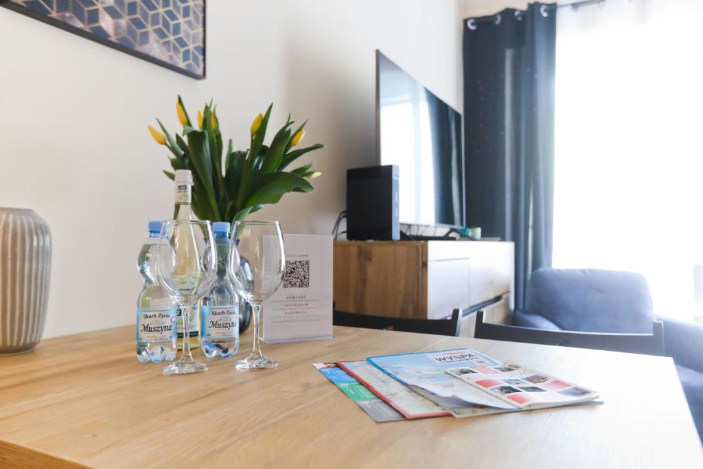 Televízia a/alebo spoločenská miestnosť v ubytovaní M&K Apartamenty Rodzinny, Gdańsk - Wyspa Sobieszewska