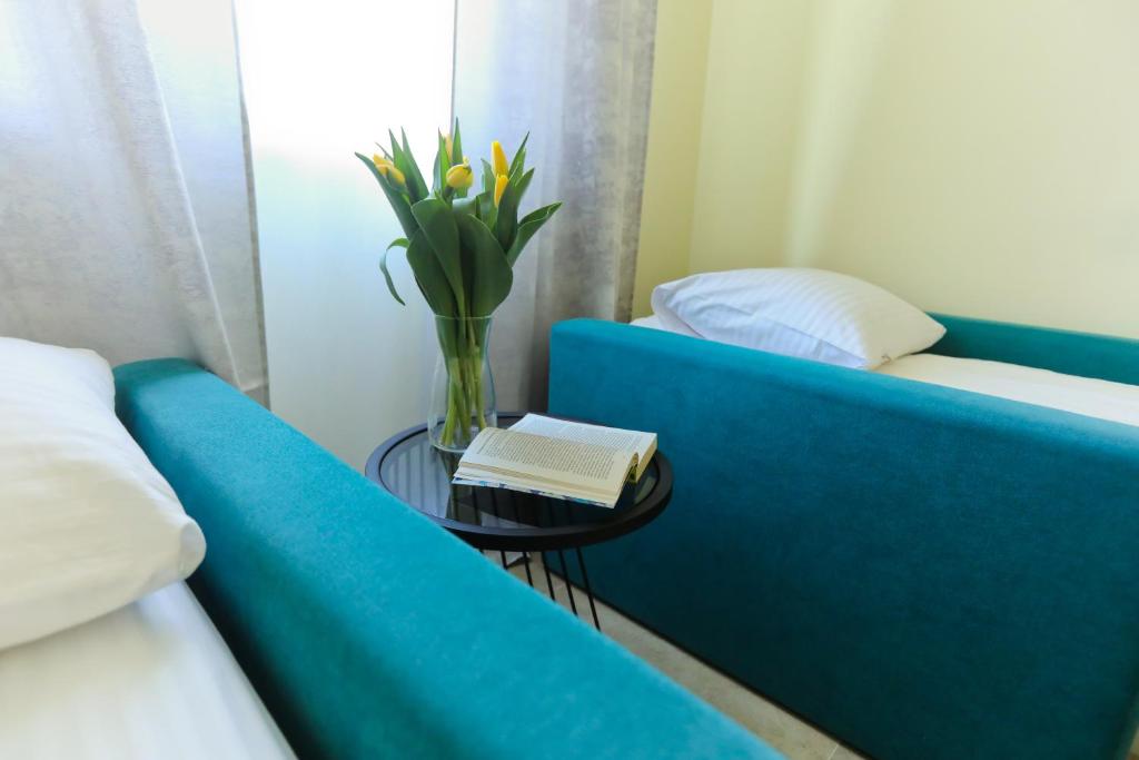 Posteľ alebo postele v izbe v ubytovaní M&K Apartamenty Rodzinny, Gdańsk - Wyspa Sobieszewska