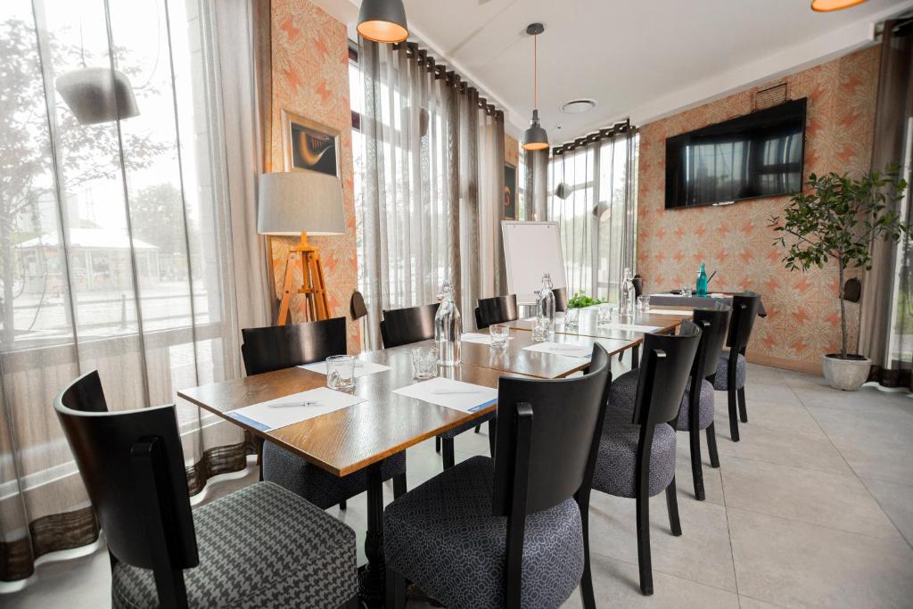 TV a/nebo společenská místnost v ubytování Wellton Riga Hotel & SPA