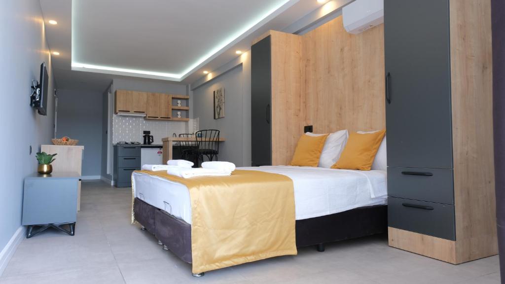 A bed or beds in a room at LİKYA202 APARt OTEL