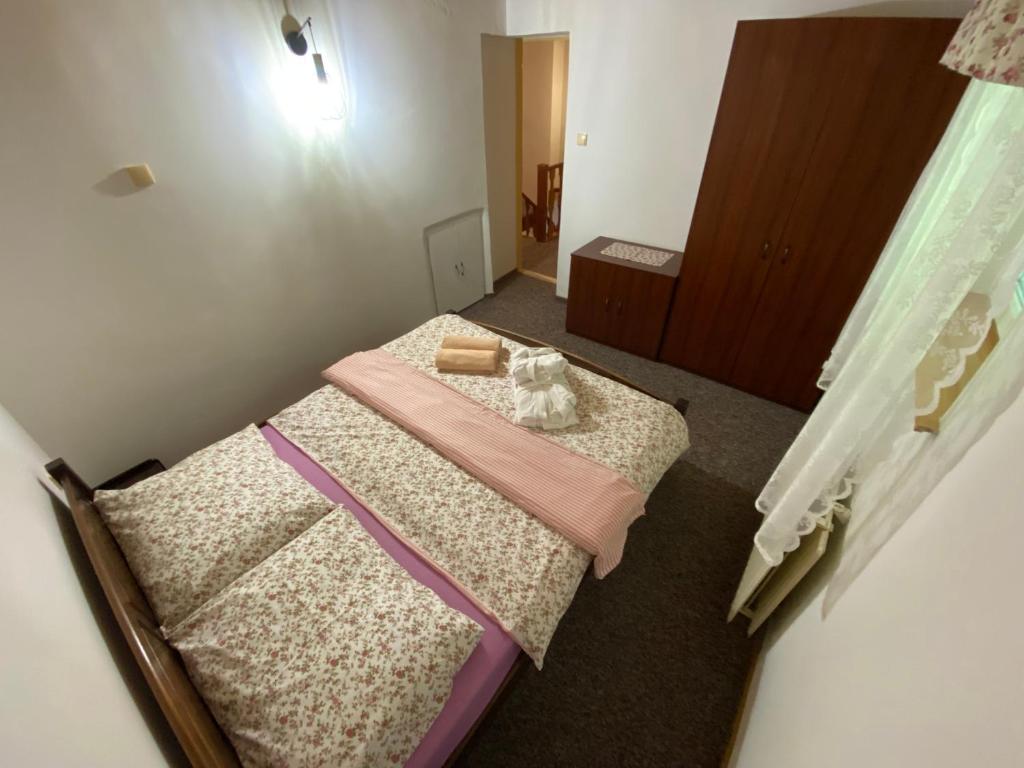 Postel nebo postele na pokoji v ubytování Chata Čeladná